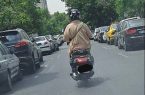 تصویر موتورسواری یک زن چادری که پربازدید شد